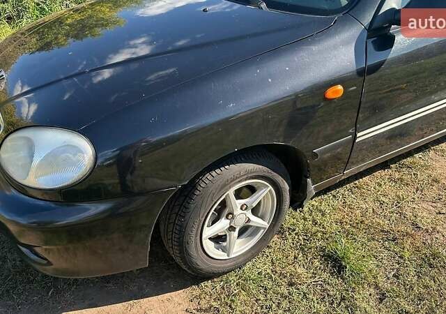 Чорний Деу Ланос, об'ємом двигуна 1.5 л та пробігом 235 тис. км за 2500 $, фото 12 на Automoto.ua