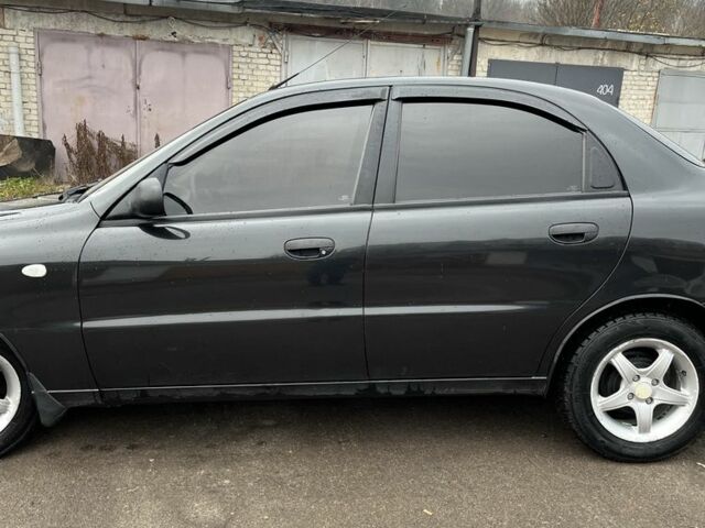 Черный Дэу Ланос, объемом двигателя 1.4 л и пробегом 108 тыс. км за 2500 $, фото 2 на Automoto.ua