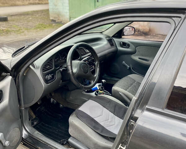 Чорний Деу Ланос, об'ємом двигуна 1.4 л та пробігом 180 тис. км за 1800 $, фото 14 на Automoto.ua