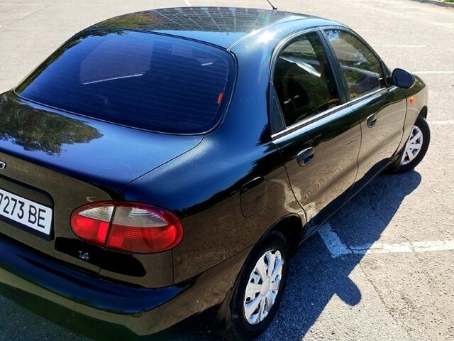 Черный Дэу Ланос, объемом двигателя 1.4 л и пробегом 155 тыс. км за 2199 $, фото 2 на Automoto.ua