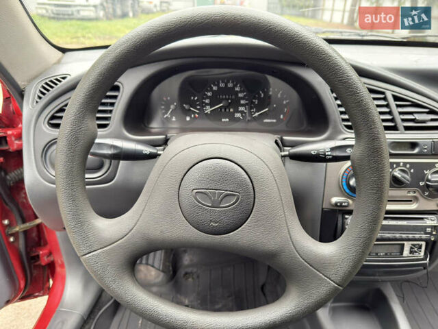 Черный Дэу Ланос, объемом двигателя 1.6 л и пробегом 156 тыс. км за 2400 $, фото 21 на Automoto.ua