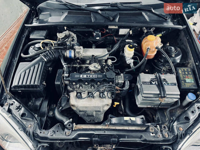 Чорний Деу Ланос, об'ємом двигуна 1.5 л та пробігом 220 тис. км за 2199 $, фото 19 на Automoto.ua