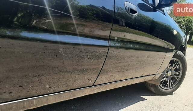 Деу Ланос 2008 у Запоріжжя на Automoto.ua Чорний Деу Ланос, об'ємом двигуна 1.5 л та пробігом 104 тис. км за 2700 $, фото 3 на Automoto.ua