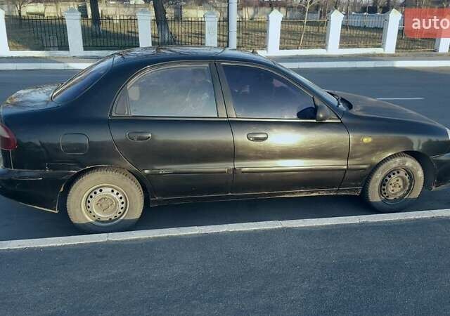 Черный Дэу Ланос, объемом двигателя 1.5 л и пробегом 240 тыс. км за 1850 $, фото 1 на Automoto.ua