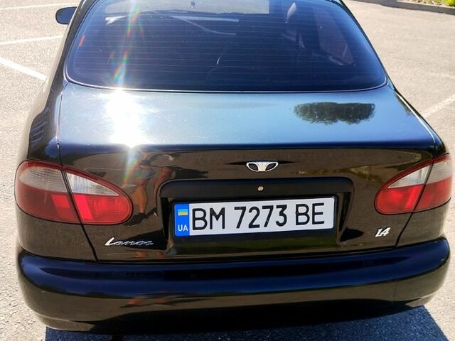 Черный Дэу Ланос, объемом двигателя 1.4 л и пробегом 155 тыс. км за 2199 $, фото 3 на Automoto.ua