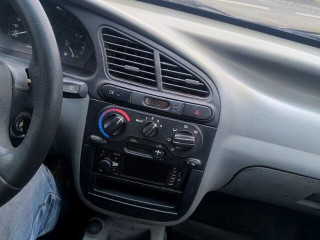 Черный Дэу Ланос, объемом двигателя 1.5 л и пробегом 220 тыс. км за 1000 $, фото 8 на Automoto.ua