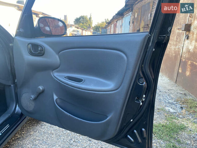 Чорний Деу Ланос, об'ємом двигуна 1.5 л та пробігом 170 тис. км за 2850 $, фото 8 на Automoto.ua