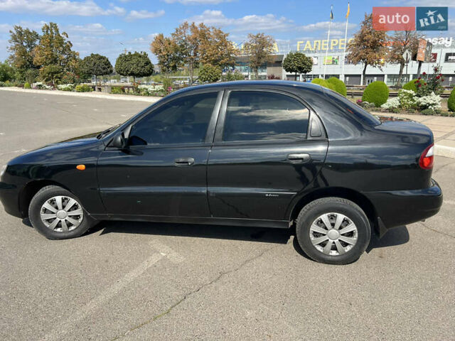 Черный Дэу Ланос, объемом двигателя 1.5 л и пробегом 140 тыс. км за 2650 $, фото 4 на Automoto.ua