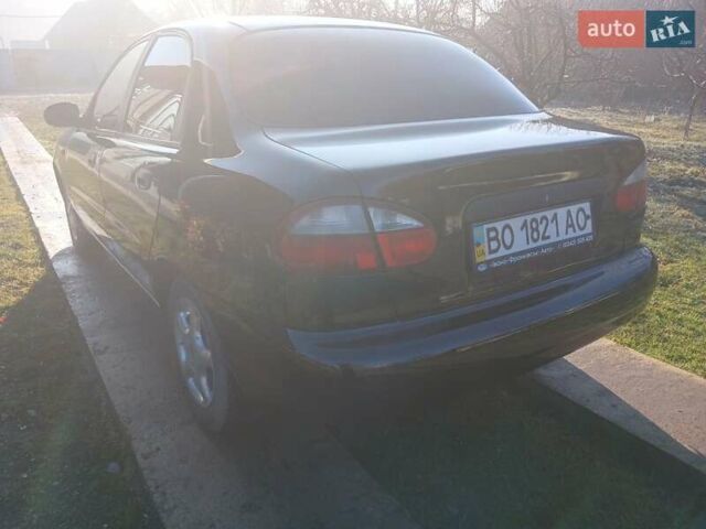 Черный Дэу Ланос, объемом двигателя 1.5 л и пробегом 76 тыс. км за 2300 $, фото 7 на Automoto.ua