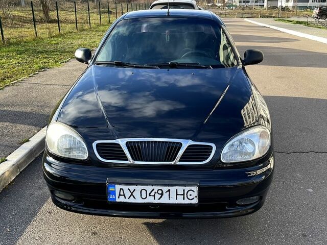 Черный Дэу Ланос, объемом двигателя 1.6 л и пробегом 326 тыс. км за 2700 $, фото 3 на Automoto.ua