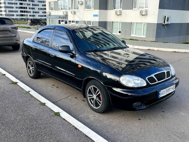 Черный Дэу Ланос, объемом двигателя 1.6 л и пробегом 326 тыс. км за 2700 $, фото 2 на Automoto.ua