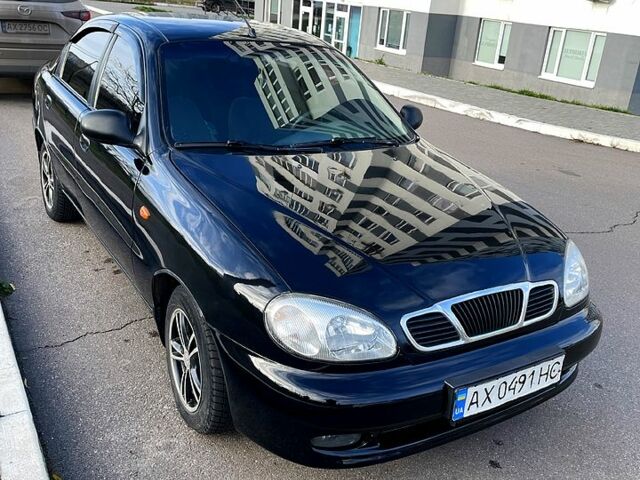 Черный Дэу Ланос, объемом двигателя 1.6 л и пробегом 326 тыс. км за 2700 $, фото 5 на Automoto.ua