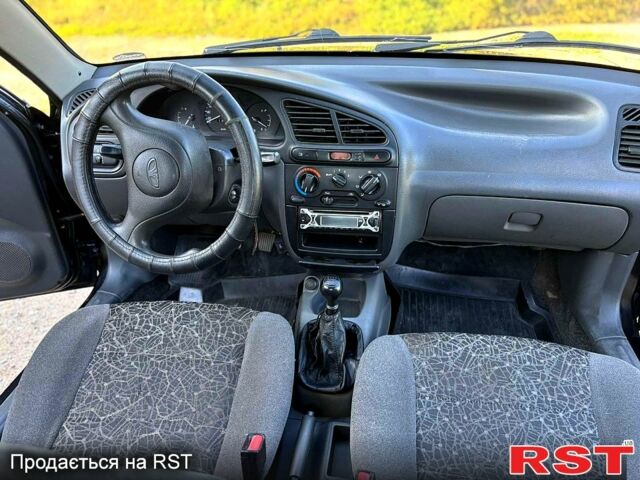 Черный Дэу Ланос, объемом двигателя 1.5 л и пробегом 162 тыс. км за 3100 $, фото 5 на Automoto.ua
