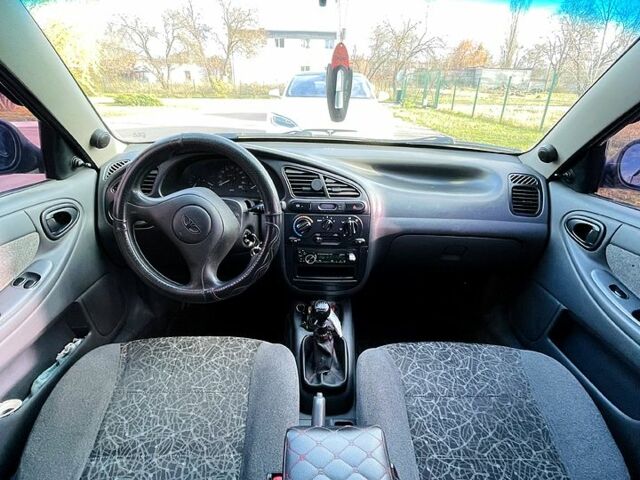 Черный Дэу Ланос, объемом двигателя 1.6 л и пробегом 326 тыс. км за 2700 $, фото 6 на Automoto.ua