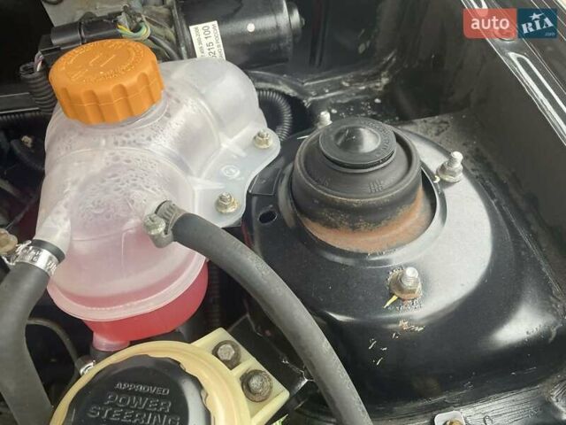 Черный Дэу Ланос, объемом двигателя 1.6 л и пробегом 170 тыс. км за 2400 $, фото 19 на Automoto.ua