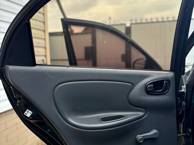 Черный Дэу Ланос, объемом двигателя 1.5 л и пробегом 162 тыс. км за 3100 $, фото 6 на Automoto.ua