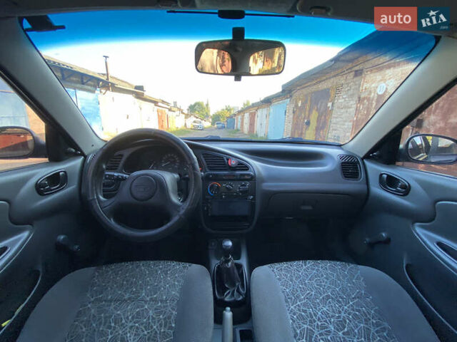 Чорний Деу Ланос, об'ємом двигуна 1.5 л та пробігом 170 тис. км за 2850 $, фото 7 на Automoto.ua