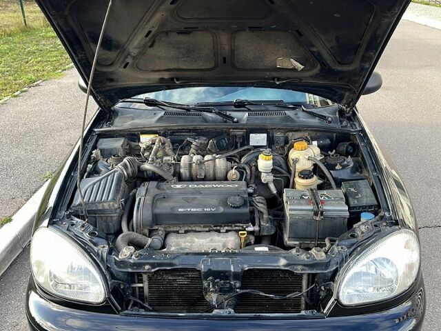 Черный Дэу Ланос, объемом двигателя 1.6 л и пробегом 326 тыс. км за 2700 $, фото 9 на Automoto.ua