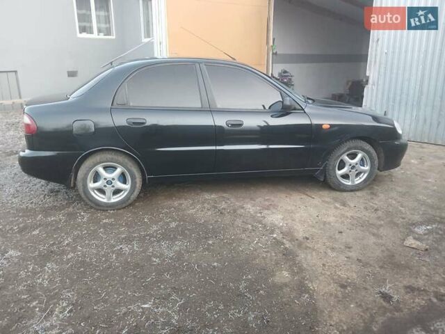 Черный Дэу Ланос, объемом двигателя 1.5 л и пробегом 76 тыс. км за 2300 $, фото 3 на Automoto.ua