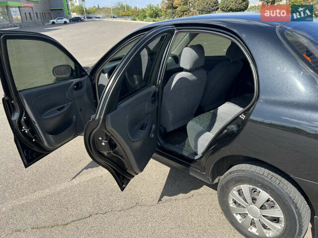 Черный Дэу Ланос, объемом двигателя 1.5 л и пробегом 140 тыс. км за 2650 $, фото 16 на Automoto.ua