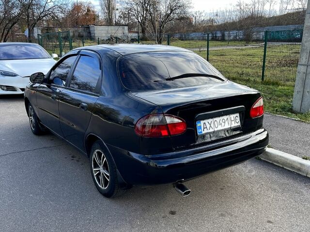 Черный Дэу Ланос, объемом двигателя 1.6 л и пробегом 326 тыс. км за 2700 $, фото 1 на Automoto.ua