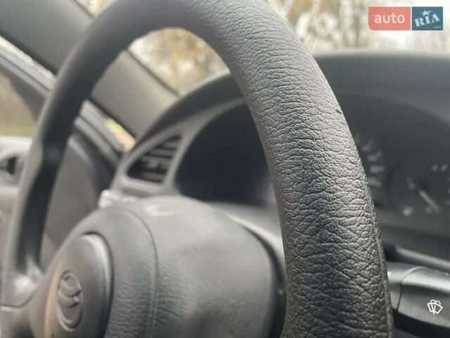 Черный Дэу Ланос, объемом двигателя 1.6 л и пробегом 170 тыс. км за 2400 $, фото 10 на Automoto.ua