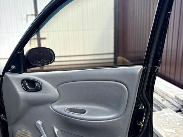 Черный Дэу Ланос, объемом двигателя 1.5 л и пробегом 162 тыс. км за 3100 $, фото 7 на Automoto.ua