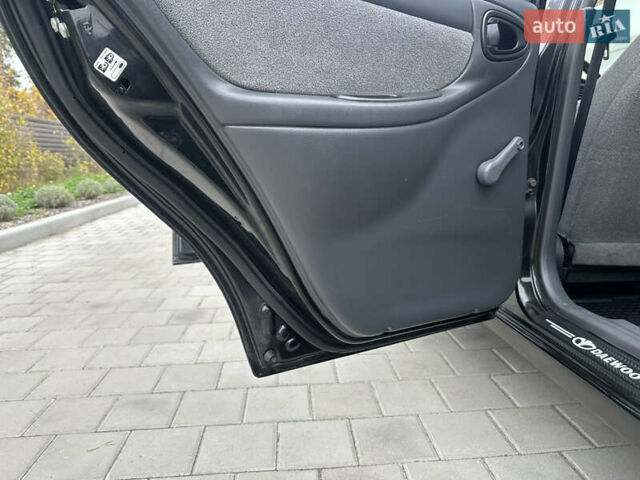 Черный Дэу Ланос, объемом двигателя 1.5 л и пробегом 158 тыс. км за 2850 $, фото 34 на Automoto.ua