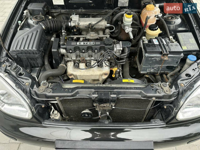 Черный Дэу Ланос, объемом двигателя 1.5 л и пробегом 158 тыс. км за 2850 $, фото 42 на Automoto.ua