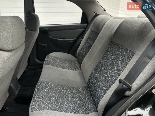 Черный Дэу Ланос, объемом двигателя 1.5 л и пробегом 158 тыс. км за 2850 $, фото 32 на Automoto.ua