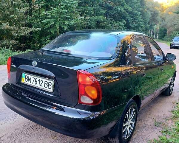 Чорний Деу Ланос, об'ємом двигуна 1.6 л та пробігом 174 тис. км за 2800 $, фото 4 на Automoto.ua