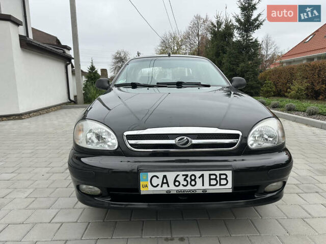 Черный Дэу Ланос, объемом двигателя 1.5 л и пробегом 158 тыс. км за 2850 $, фото 3 на Automoto.ua