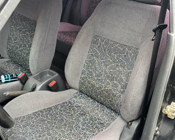 Черный Дэу Ланос, объемом двигателя 1.5 л и пробегом 270 тыс. км за 2550 $, фото 6 на Automoto.ua