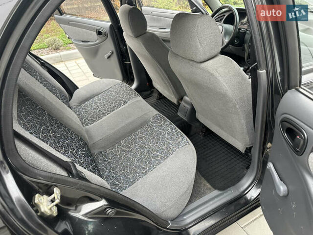 Черный Дэу Ланос, объемом двигателя 1.5 л и пробегом 158 тыс. км за 2850 $, фото 31 на Automoto.ua