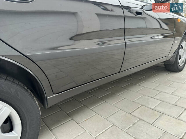 Черный Дэу Ланос, объемом двигателя 1.5 л и пробегом 158 тыс. км за 2850 $, фото 19 на Automoto.ua