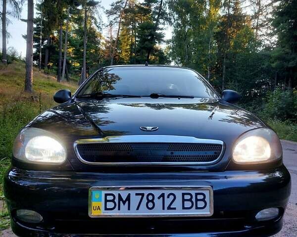 Чорний Деу Ланос, об'ємом двигуна 1.6 л та пробігом 174 тис. км за 2800 $, фото 22 на Automoto.ua
