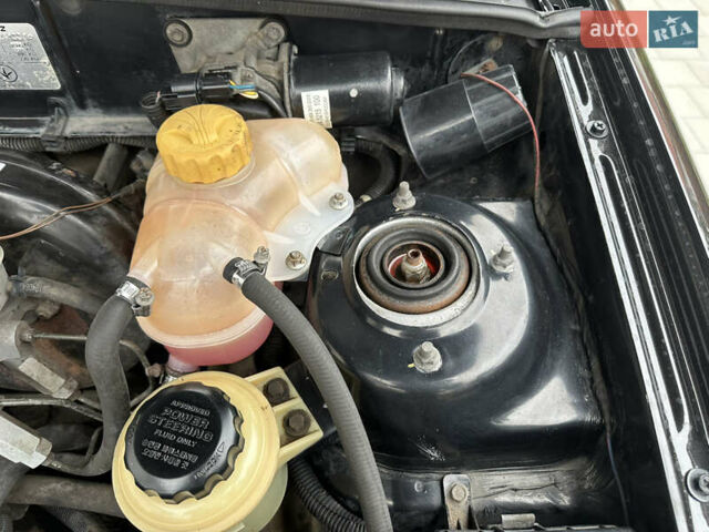 Черный Дэу Ланос, объемом двигателя 1.5 л и пробегом 158 тыс. км за 2850 $, фото 39 на Automoto.ua