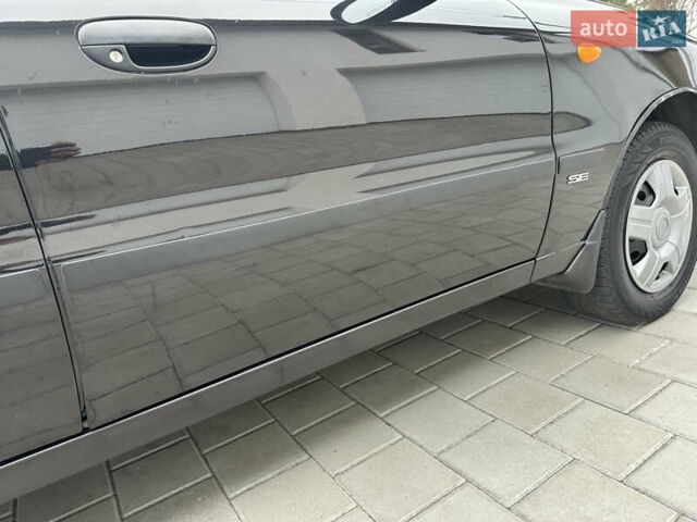 Черный Дэу Ланос, объемом двигателя 1.5 л и пробегом 158 тыс. км за 2850 $, фото 20 на Automoto.ua