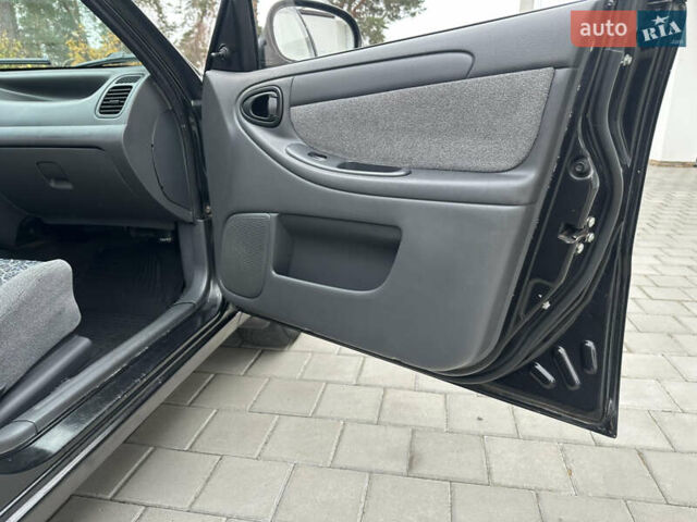 Черный Дэу Ланос, объемом двигателя 1.5 л и пробегом 158 тыс. км за 2850 $, фото 36 на Automoto.ua