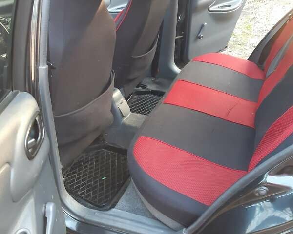 Чорний Деу Ланос, об'ємом двигуна 1.6 л та пробігом 160 тис. км за 2900 $, фото 8 на Automoto.ua