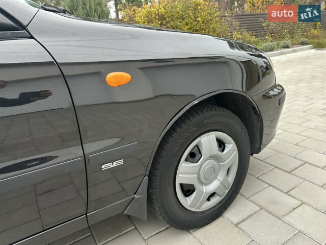 Черный Дэу Ланос, объемом двигателя 1.5 л и пробегом 158 тыс. км за 2850 $, фото 21 на Automoto.ua