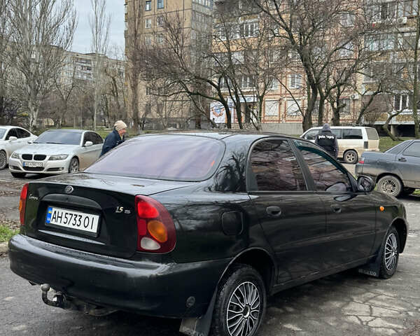 Черный Дэу Ланос, объемом двигателя 1.5 л и пробегом 270 тыс. км за 2550 $, фото 2 на Automoto.ua