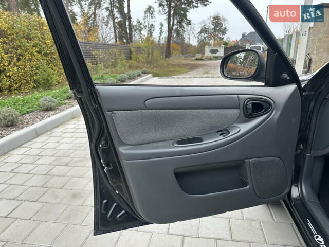 Черный Дэу Ланос, объемом двигателя 1.5 л и пробегом 158 тыс. км за 2850 $, фото 35 на Automoto.ua