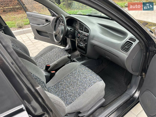 Черный Дэу Ланос, объемом двигателя 1.5 л и пробегом 158 тыс. км за 2850 $, фото 30 на Automoto.ua
