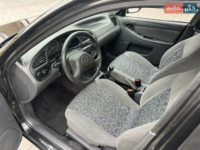 Черный Дэу Ланос, объемом двигателя 1.5 л и пробегом 158 тыс. км за 2850 $, фото 27 на Automoto.ua