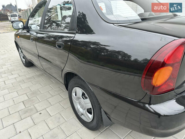 Черный Дэу Ланос, объемом двигателя 1.5 л и пробегом 158 тыс. км за 2850 $, фото 18 на Automoto.ua