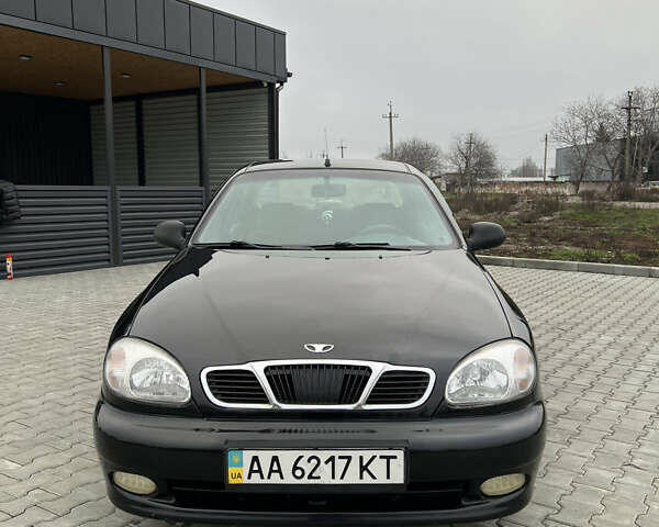 Черный Дэу Ланос, объемом двигателя 1.5 л и пробегом 158 тыс. км за 3100 $, фото 1 на Automoto.ua