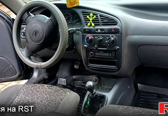 Черный Дэу Ланос, объемом двигателя 1.5 л и пробегом 170 тыс. км за 2500 $, фото 9 на Automoto.ua