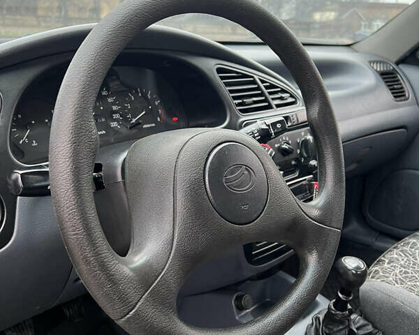 Черный Дэу Ланос, объемом двигателя 1.5 л и пробегом 158 тыс. км за 3100 $, фото 13 на Automoto.ua