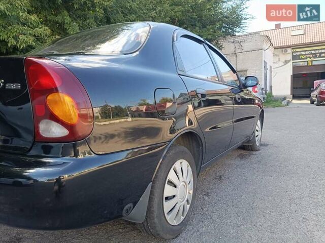 Чорний Деу Ланос, об'ємом двигуна 1.5 л та пробігом 155 тис. км за 2800 $, фото 3 на Automoto.ua